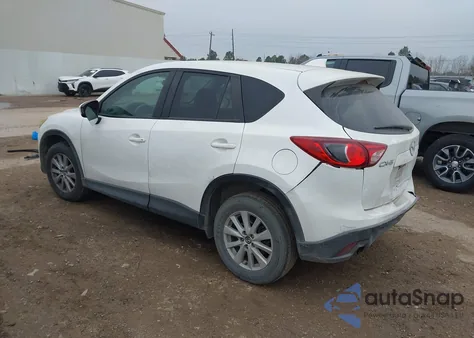 2014 Mazda Cx-5 Touring z USA, uszkodzony, nr VIN JM3KE2CY9E0318849